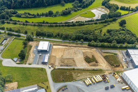 Aerial view, construction site new building Lausberg Kunststofftechnik, industrial estate