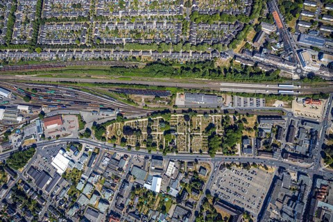 Aerial view, centre of Mörs, former goods station, railway tracks, cemetery Mörs, miners'