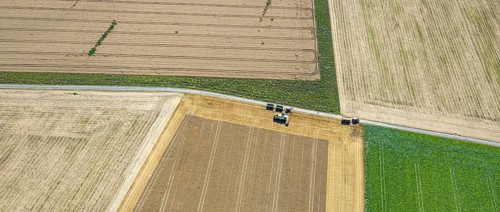 Aerial view, harvesting vehicles with straw bales in Ruploh, grain harvest, fields, Soest, Soester