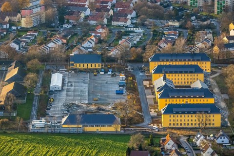 Aerial view, construction area former Kanaal van Wessem barracks, housing estate and refugee