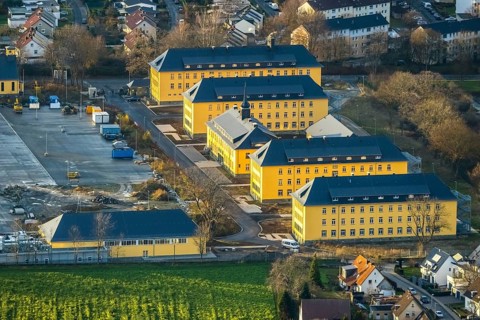 Aerial view, construction area former Kanaal van Wessem barracks, housing estate and refugee