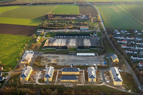 Aerial view, construction area former Kanaal van Wessem barracks, housing estate and refugee