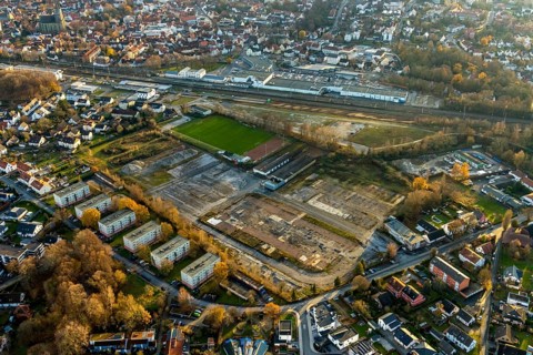 Aerial view, building site Werkstraße for commercial development, sports ground Jahnplatz, Soest,