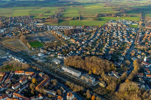 Aerial view, building site Werkstraße for commercial development, sports ground Jahnplatz, Soest,