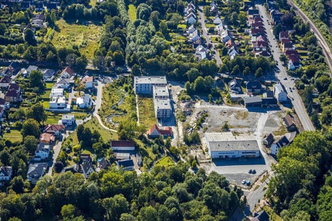Aerial view, three residential buildings at the renaturalised Soestbach, former outdoor swimming