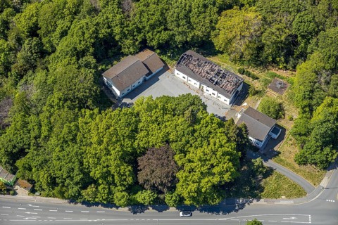 Aerial view, burnt down, destroyed OBDACHLOSENASY, former company building Autoreifen und Autoteile