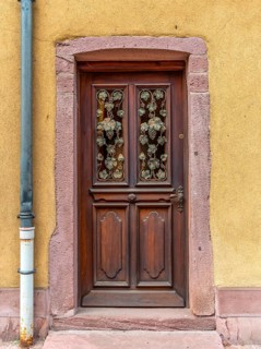 Ornamented door seen in Kaysersberg, a historical town and former commune in Alsace in northeastern