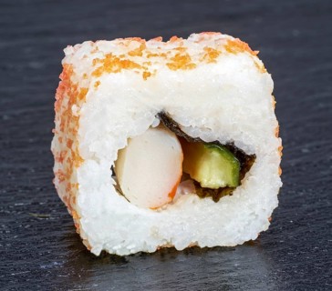 Sushi dish on dark grey stone surface