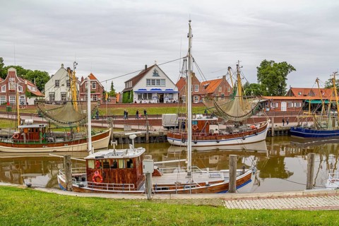 Idyllic port scenery in Greetsiel, a idyllic village located in East Frisia, Northern Germany