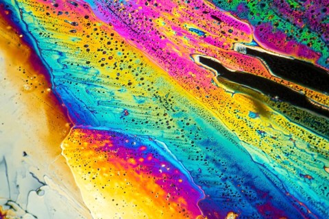 Colorful microscopic shot of Sodium acetate micro crystals in polarized light
