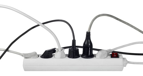 Studio photography of a multiple socket and connected plugs isolated on white with clipping path