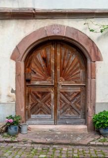 Historic door seen in Kaysersberg, a historical town and former commune in Alsace in northeastern