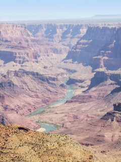 Sunny aerial view including the Colorado River at the Grand Canyon National Park in Arizona, USA
