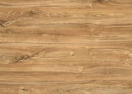 A full frame brown wood grain surface