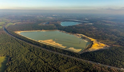 Aerial view of the Silbersee with quartz sand extraction in a forest area in the district