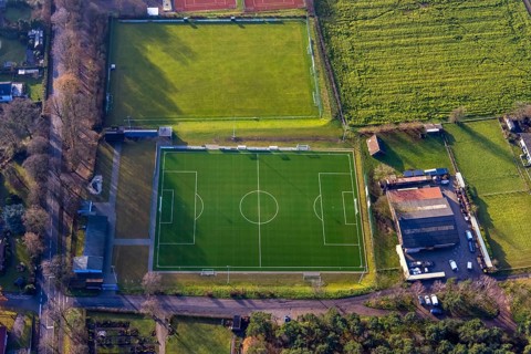 Aerial view of the football ground ofDJK Blau-Weiß Lavesum 1931 and tennis court in the district