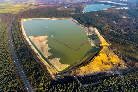 Aerial view of the Silbersee with quartz sand extraction in a forest area in the district