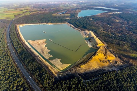 Aerial view of the Silbersee with quartz sand extraction in a forest area in the district