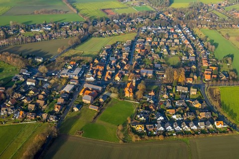 Aerial view of the catholic St.St. Anthony's Church and local view of Lavesum in Haltern am See in