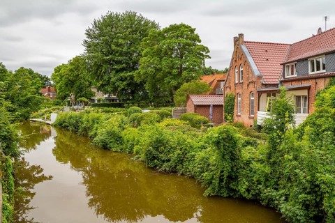 Idyllic waterside scenery in Greetsiel, a idyllic village located in East Frisia, Northern Germany