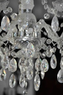 Detail shot of a chandelier in dark back