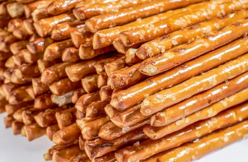Closeup of some stacked salt sticks in light back
