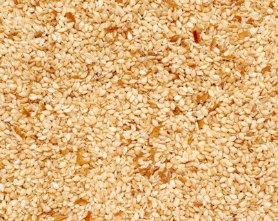 Full frame closeup of mostly sesame seeds
