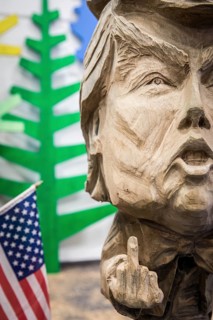 DEU Germany Germany Berlin The bust of US President Donald Trump, made by a chainsaw artist, at the
