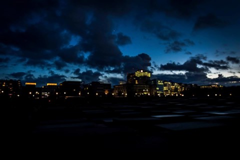 DEU Germany Germany Berlin The Holocaust Memorial at blue hour under a cloudy sky in the direction