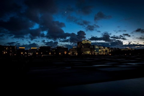 DEU Germany Germany Berlin The Holocaust Memorial at blue hour under a cloudy sky in the direction