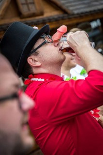 DEU Germany Germany Berlin Groom drinks with penis nose during a bachelor party on Alexanderplatz
