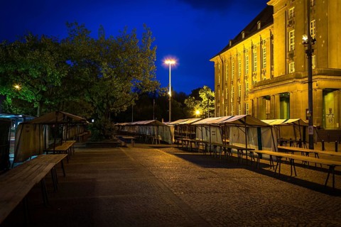 DEU Germany Germany Berlin The flea market stalls in front of Schöneberg Town Hall in the evening