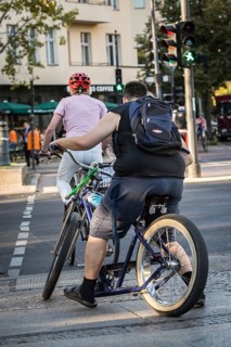 DEU Germany Germany Berlin Cyclist crossing a pedestrian crossing in West Berlin at the corner of