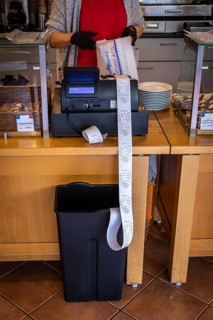 DEU Germany Germany Berlin The receipts in a bakery in Schöneberg are received by a rubbish bin