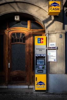 DEU Germany Germany Berlin An ATM stands in front of the entrance to an old building on
