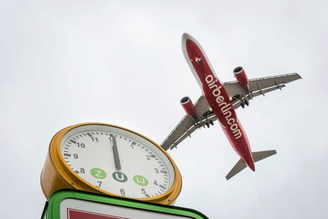 DEU Germany Germany Berlin Landing approach of an Air Berlin aircraft over Kurt-Schuhmacher-Platz