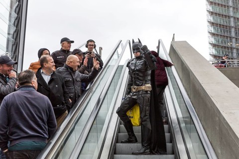 DEU Germany Germany Berlin A man wearing a Batman costume walks across Potsdamer Platz