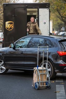DEU Germany Germany Berlin A UPS parcel courier on Kurfürstendamm