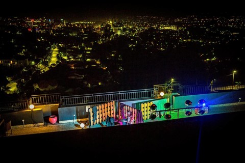 RWA RWANDA RUANDA Kigali A performance by the dancer Shema Isaak on the terrace of the Panorama Bar
