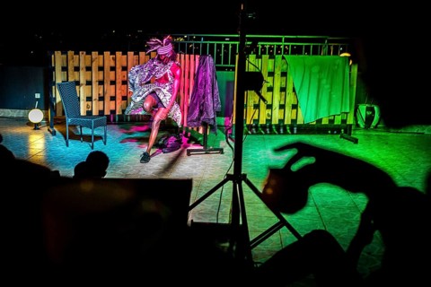 RWA RWANDA RUANDA Kigali A performance by the dancer Shema Isaak on the terrace of the Panorama Bar