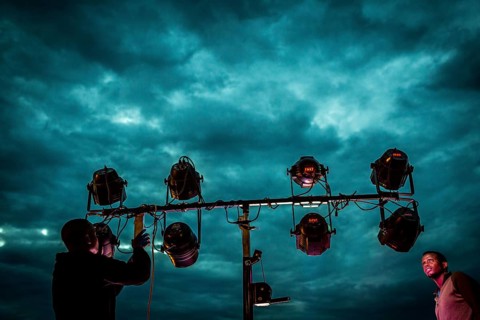 RWA RWANDA RUANDA Kigali Installation of floodlights on the terrace of Panorama Bar Ivy against the
