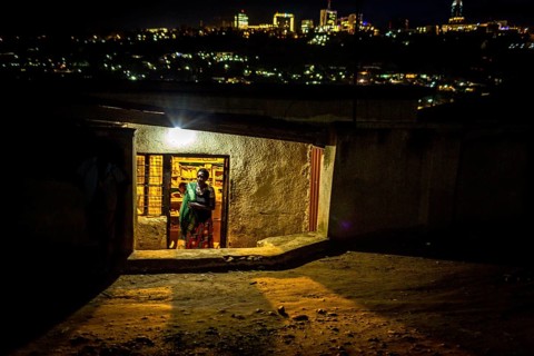RWA RWANDA RUANDA Kigali Illuminated houses in a poor neighbourhood. The Kiyovu banking district in
