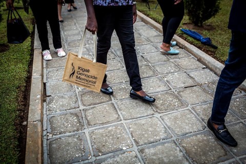 RWA RWANDA RUANDA Kigali A visitor carries a bag with the logo of the genocide memorial in her hand