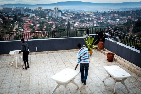 RWA RWANDA RUANDA Kigali workers on the terrace of the Panorama Bar Ivy