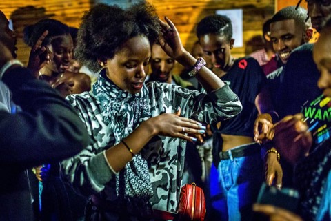 RWA RWANDA RUANDA Kigali Guests at a regular party organised by the Inema Gallery. Artists, locals