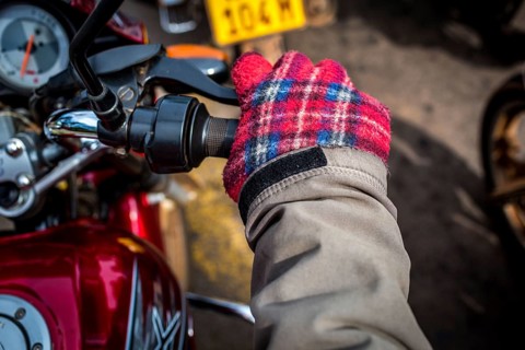 RWA RWANDA RUANDA Kigali A taxi driver with home-made chequered gloves