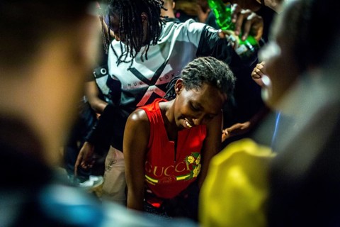 RWA RWANDA RUANDA Kigali Guests at a regular party organised by the Inema Gallery. Artists, locals