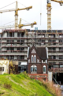 DEU Germany Germany Berlin View of a construction site with a heritage-protected building in front