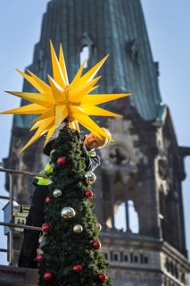 DEU Germany Germany Berlin Setting up the Christmas market at Breitscheidtplatz. The memorial