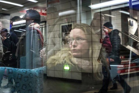 DEU Germany Germany Berlin Scenes in and around the S-Bahn.reflection of travellers